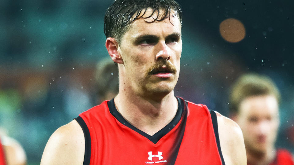 Essendon's Joe Daniher is pictured walking off the ground after an AFL match against Port Adelaide.