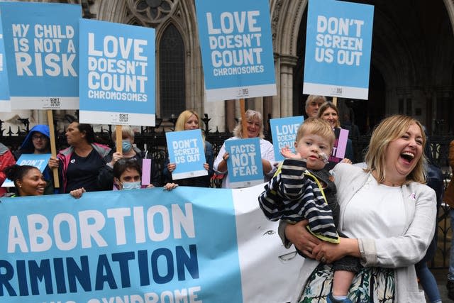 Maire Lea-Wilson, 33, and son Aidan, who has Down’s syndrome (Stefan Rousseau/PA)