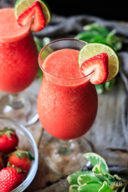 <p>Savor the Flavor</p><p>This non-alcoholic strawberry drink recipe is easy to make in your blender with just a few ingredients and it’s sure to be a favorite treat for kids, expecting moms and party guests.</p><p><strong>Get the recipe: <a href="https://savortheflavour.com/best-virgin-strawberry-daiquiri/" rel="nofollow noopener" target="_blank" data-ylk="slk:Virgin Strawberry Daiquiri;elm:context_link;itc:0;sec:content-canvas" class="link rapid-noclick-resp">Virgin Strawberry Daiquiri</a></strong></p>