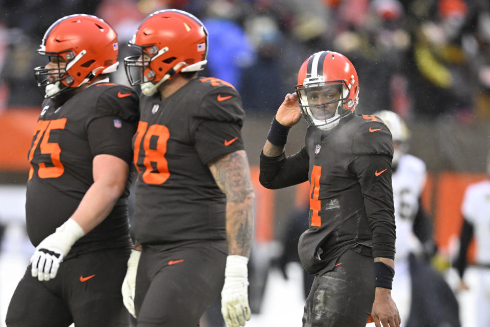 Cleveland Browns quarterback Deshaun Watson (4) walks off the field after losing to the New Orleans Saints, 17-10, in an NFL football game, Saturday, Dec. 24, 2022, in Cleveland. (AP Photo/David Richard)