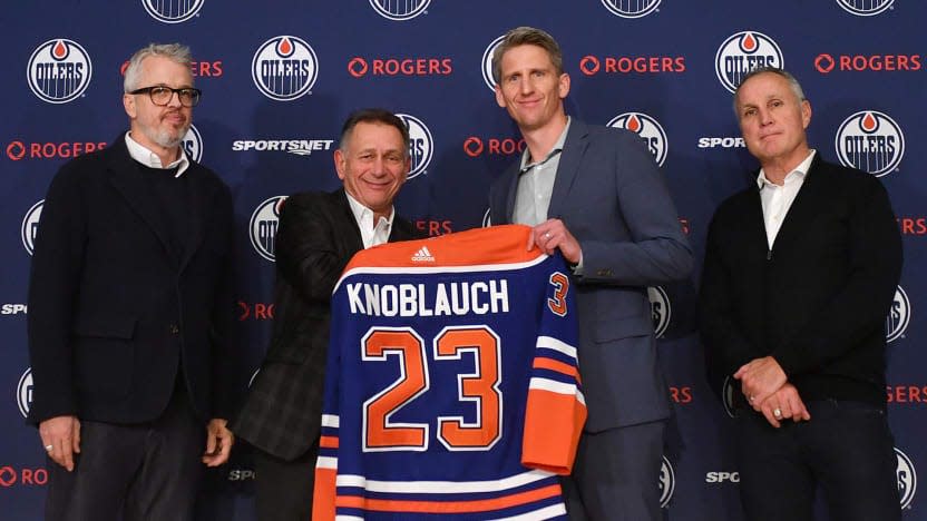 The Edmonton Oilers introduce Kris Knoblauch as their new coach during Sunday's press conference. The Oilers hired Knoblauch, who coached the Erie Otters from 2012-17 and to the Ontario Hockey League's Robertson Cup title in his final season. Pictured left to right are Edmonton CEO Jeff Jackson; general manager Ken Holland; Knoblauch; and assistant coach Paul Coffey, a former Oiler and 2004 Hockey Hall of Fame inductee.