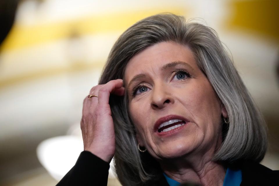 Sen. Joni Ernst, R-Iowa, speaks to reporters after a closed-door lunch meeting with Senate Republicans at the U.S. Capitol October 24, 2023 in Washington, D.C.