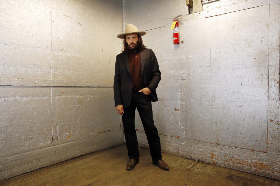 Los Angeles artist Erik Brunetti, the founder of the streetwear clothing company "FUCT," poses for a photo in Los Angeles Thursday, April, 11, 2019. “We wanted the viewer to question it: Like, is that pronounced the way I think it’s pronounced?” he said of his streetwear brand “FUCT,” which began selling clothing in 1991. On April 15, the Supreme Court will hear Brunetti’s challenge to a part of federal law that says officials should refuse to register trademarks that are “scandalous” or “immoral.” (AP Photo/Damian Dovarganes)