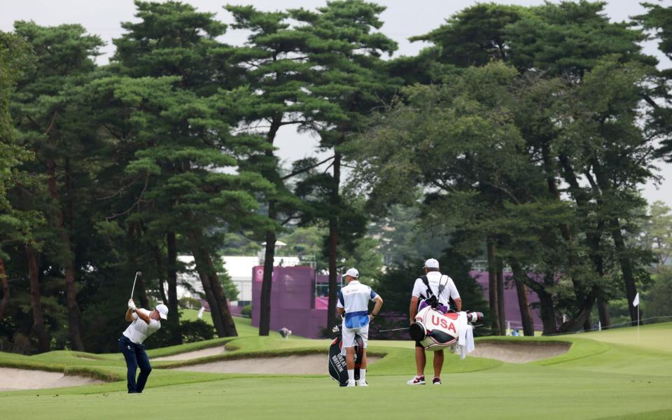 Paul Casey of Team Great Britain plays an approach shot on the second fairway during the first round of the Men's Individual Stroke Play  - Getty Images