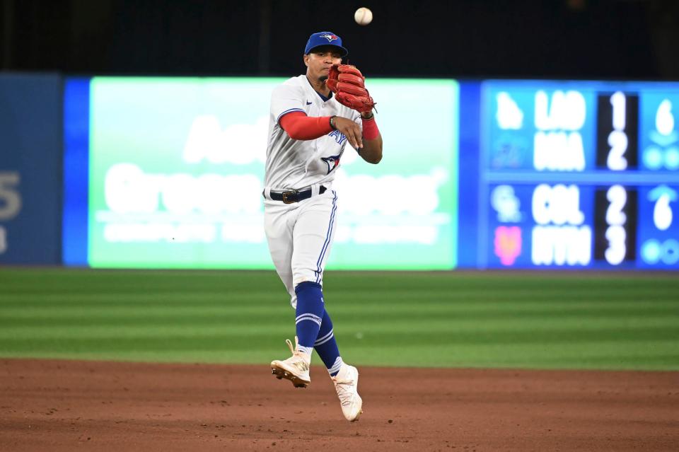 Santiago Espinal, who the Reds traded for on Wednesday, is known for his defense.  The Reds acquired Espinal in the wake of the team losing Noelvi Marte (suspension) and Matt McLain (injured shoulder), who each could play shortstop.