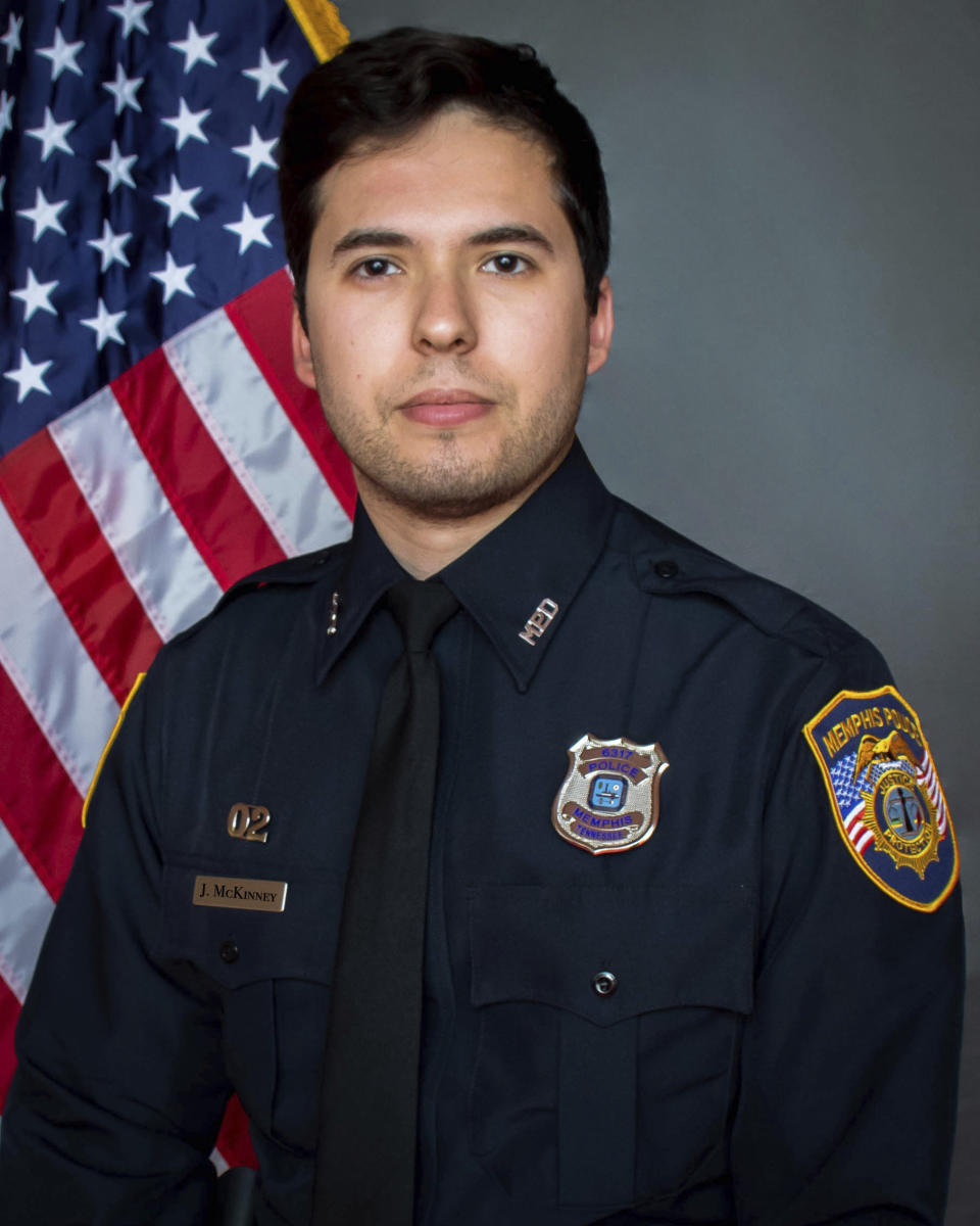 This image provided by the Memphis Police Department shows officer Joseph McKinney who was killed in a shootout that developed as officers investigated a suspicious vehicle on April 12, 2024. A 17-year-old suspect charged in the fatal shooting of McKinneyr has not been accused of first-degree murder because information obtained by the district attorney's office shows the officer was killed by friendly fire, officials said. (Memphis Police Department via AP)