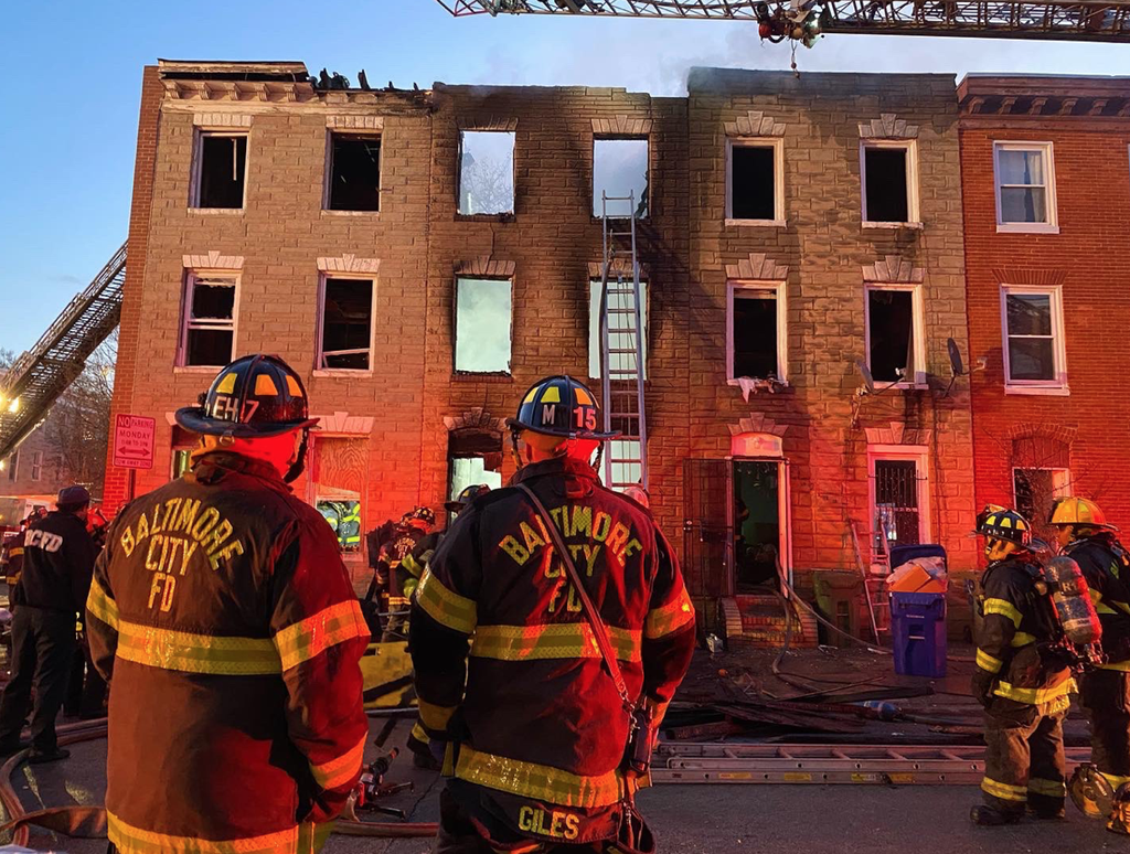 Baltimore City firefighter at the scene of a building collapse that claimed the lives of three firefighters  (Baltimore City Fire Department)