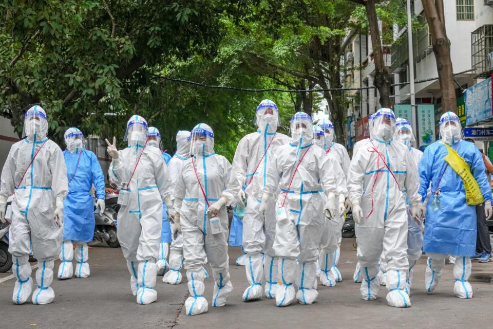 SNAYA, CHINA - AUGUST 16: Volunteers enter a locked down community amid COVID-19 epidemic on August 16, 2022 in Sanya, Hainan Province of China. (Photo by Wu Wei/VCG via Getty Images)