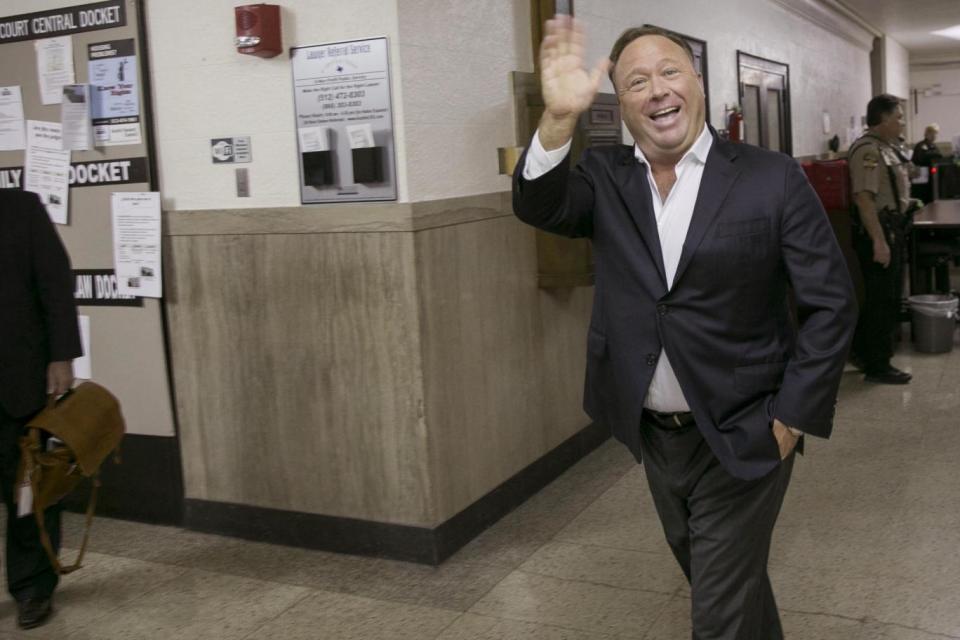 Alex Jones: his lawyer claims that Jones only peddles fake news as an act in order to get ratings (AP)