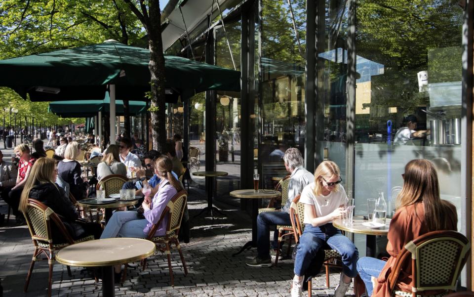 Cafes, schools, bars and restaurants have all stayed open in Sweden during the pandemic - Loulou D'Aki/Bloomberg