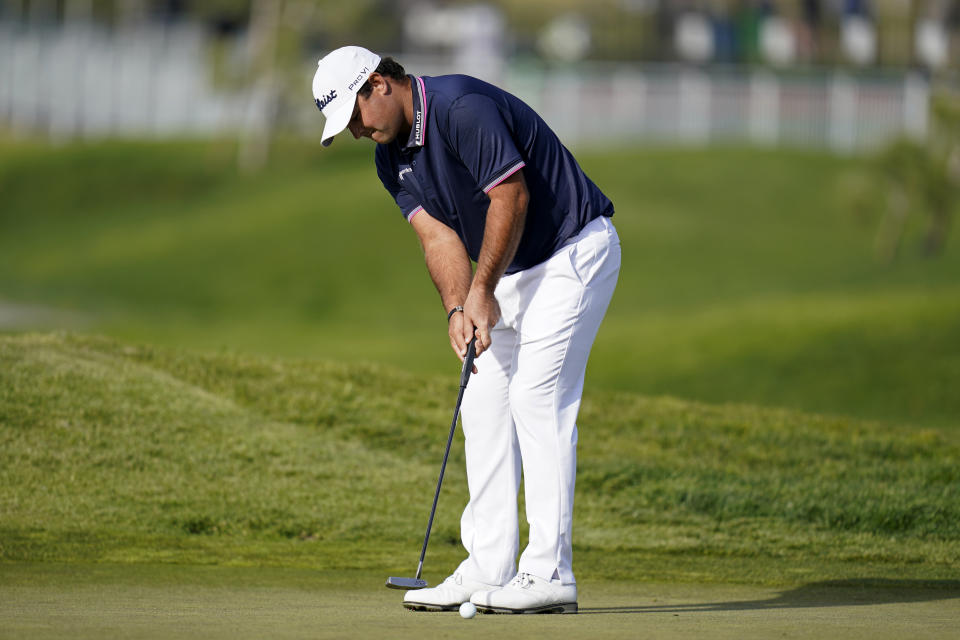 Patrick Reed putts on the ninth hole of the North Course during the first round of the Farmers Insurance Open golf tournament at Torrey Pines on Thursday, Jan. 28, 2021, in San Diego. (AP Photo/Gregory Bull)