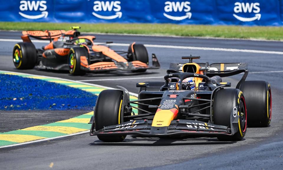 <span>Lando Norris in the McLaren pursues Max Verstappen’s Red Bull.</span><span>Photograph: David Kirouac/USA Today Sports</span>