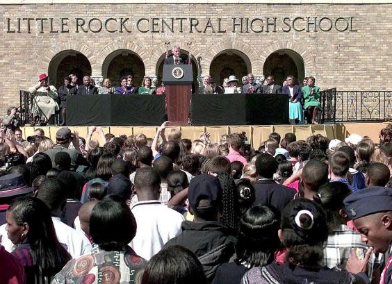 Bill Clinton at the Central High School in Arkansas (Getty images)