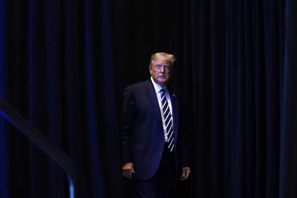 President Donald Trump arrives to speak to the 2020 Council for National Policy Meeting, Friday, Aug. 21, 2020, in Arlington, Va. (AP Photo/Evan Vucci)