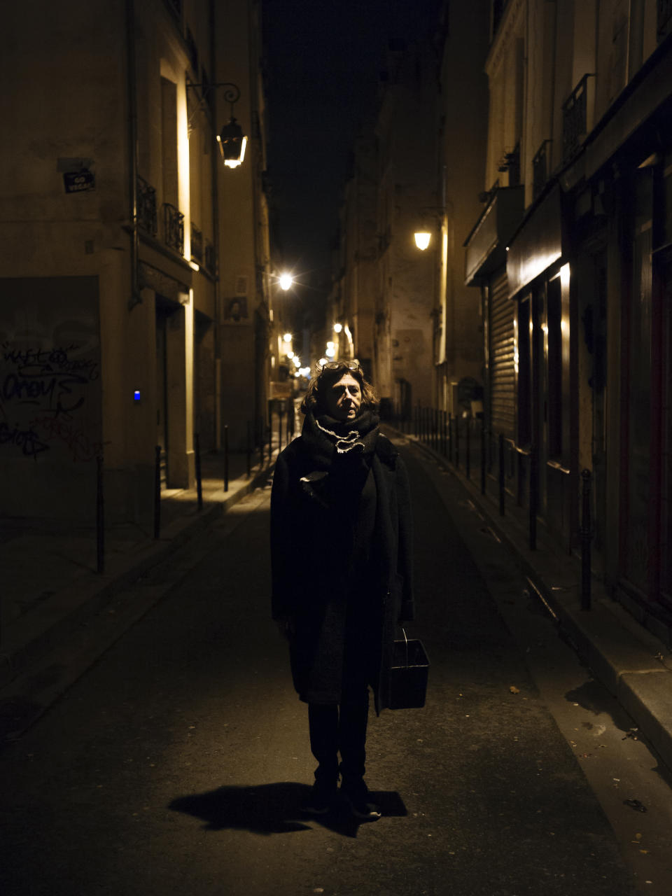 France, 55, a self-employed worker from Paris, poses for a portrait in Paris. France has never been an activist in her past. Her daughter introduced her to the pasting group after France experienced some domestic violence at the hands of her former husband. (Photo: Kamil Zihnioglu/AP)