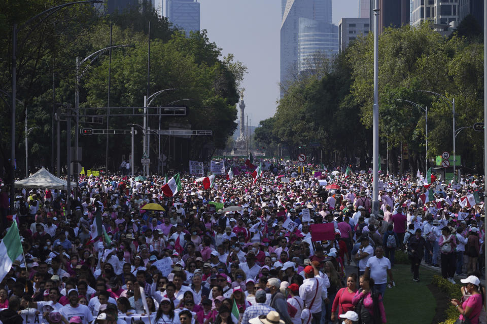 Citizen organizations march in support of Mexico's National Elections Institute as President Andrés Manuel López Obrador pushes to reform it, in Mexico City, Sunday, Nov. 13, 2022. (AP Photo/Marco Ugarte)