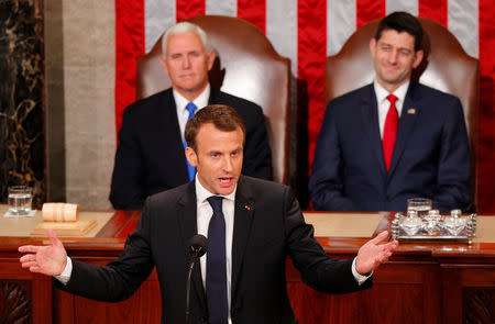 French President Emmanuel Macron gestures after addressing a joint meeting of Congress in the House chamber of the U.S. Capitol in Washington, U.S., April 25, 2018. REUTERS/Brian Snyder