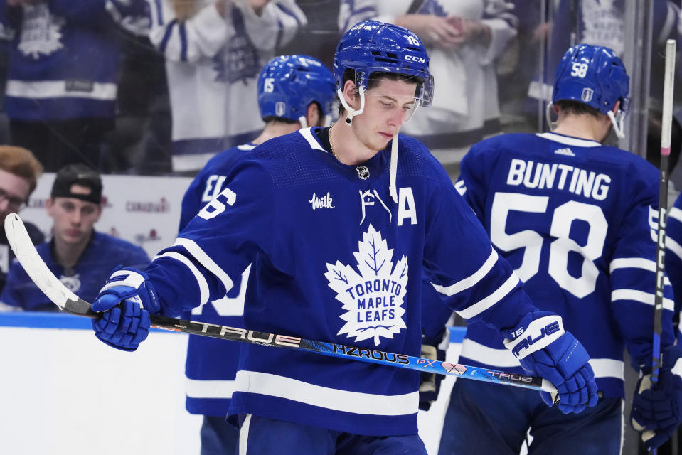 Toronto Maple Leafs forward Mitchell Marner (16) reacts to the team's overtime loss to the Florida Panthers in Game 5 of an NHL hockey Stanley Cup second-round playoff series Friday, May 12, 2023, in Toronto. (Frank Gunn/The Canadian Press via AP)