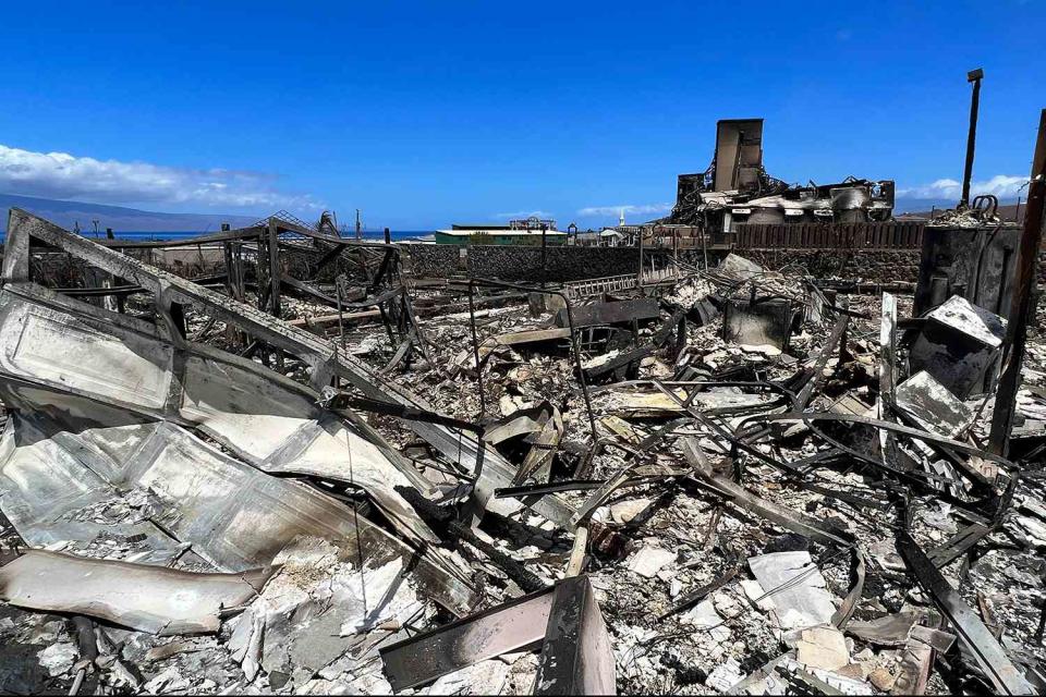 <p> SEBASTIEN VUAGNAT/AFP via Getty Images</p> Destroyed buildings and homes left in the aftermath of a wildfire in Lahaina