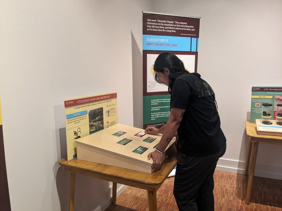 Visitor participating in the interactive Ute Knowledge Colorado’s Original STEM exhibit, Colorado Springs Pioneers Museum.