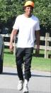 <p>JAY-Z takes a walk through The Hamptons, New York, wearing a white tee and track pants on Wednesday.</p>