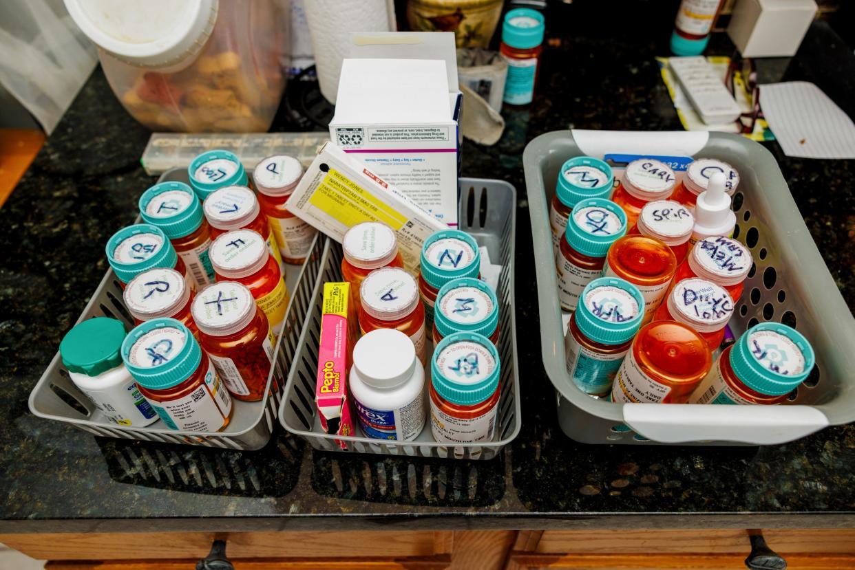 A collection of pills on a kitchen sink