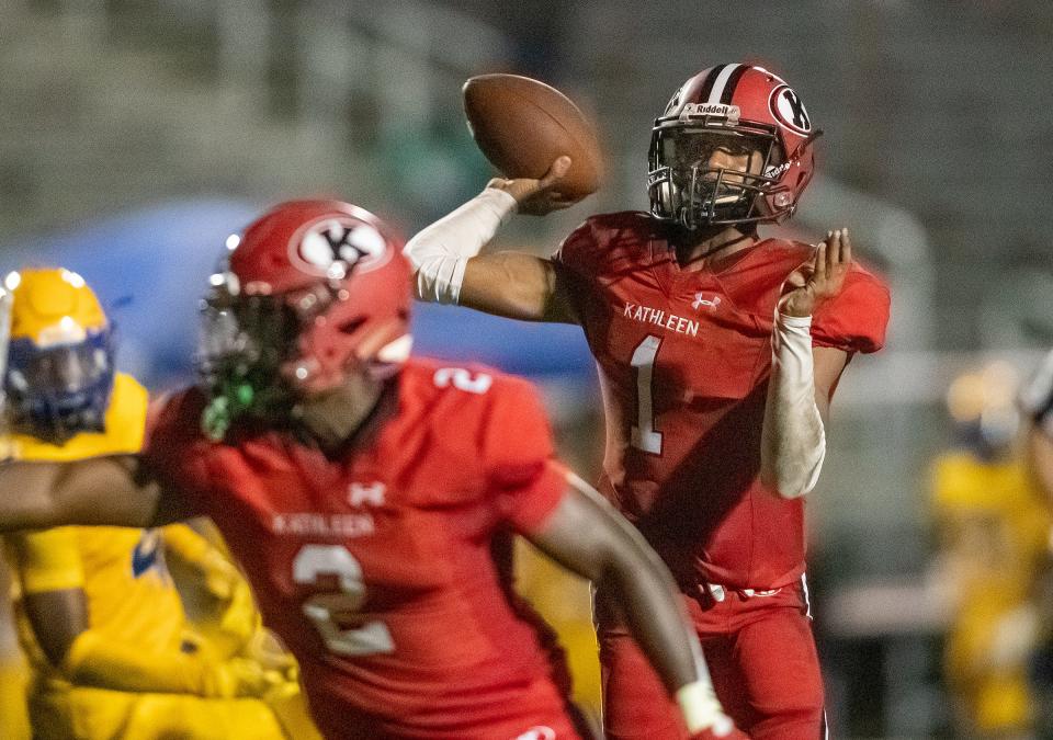 Kathleen quarterback  (1)  Shadarian Harrison looks past Auburndale defenders for a receiver during first half action at Kathleen High School in Lakeland  Fl. Friday Sept. 10 2021.  ERNST PETERS/ THE LEDGER