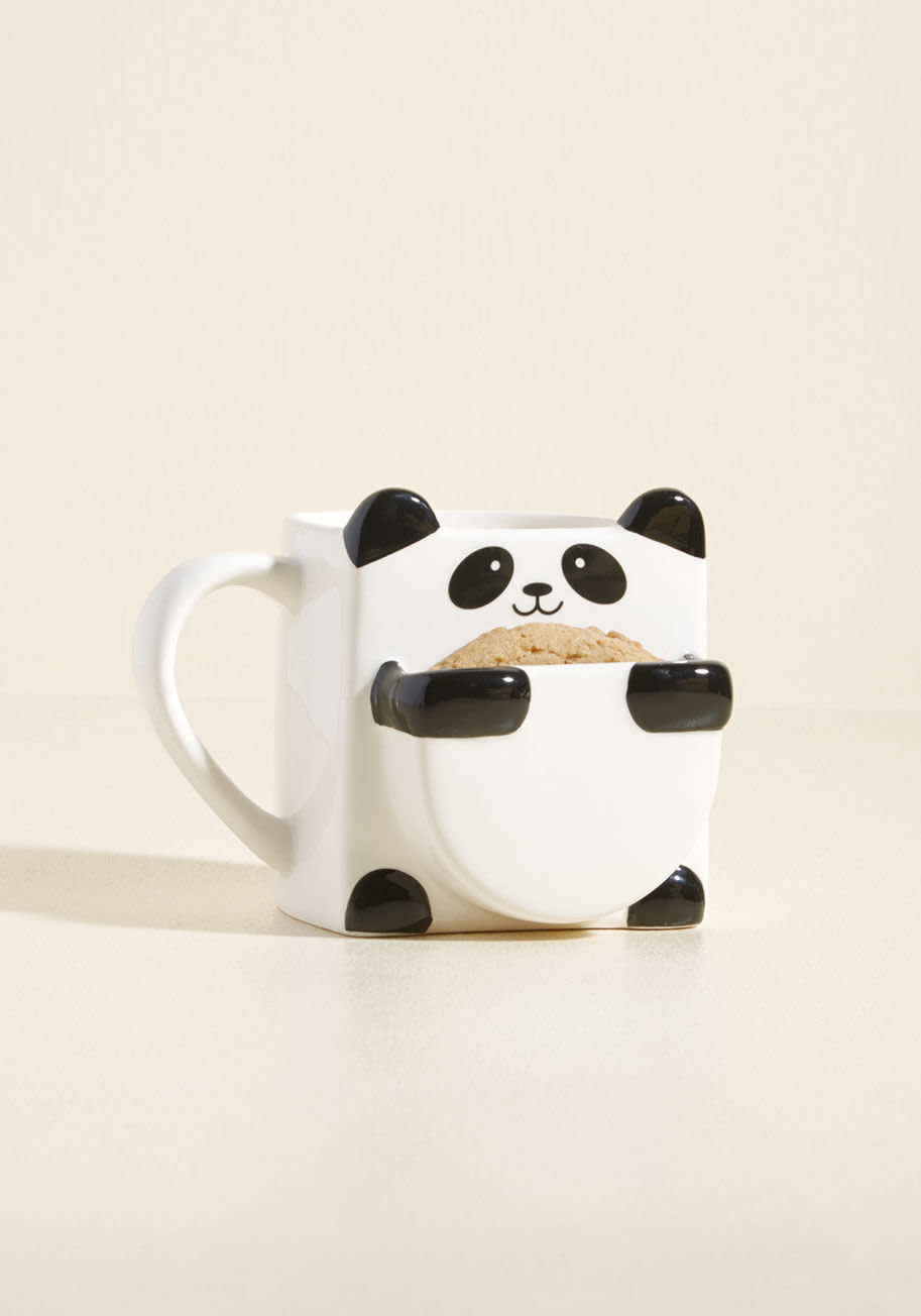 <a href="https://www.modcloth.com/shop/quirky-decor/well-cookie-here%21-panda-mug/153926.html?cgid=quirky_decor_53377&amp;dwvar_153926_color=BW" target="_blank">Shop it here</a>.&nbsp;