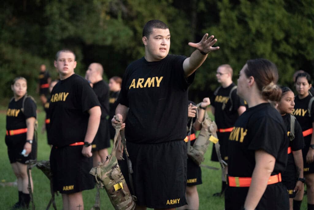 Students gather during physical training exercises in the new Army prep course at Fort Jackson in Columbia, S.C. Saturday, Aug. 27, 2022. The Army’s new program prepares recruits for the demands of basic training. (AP Photo/Sean Rayford)