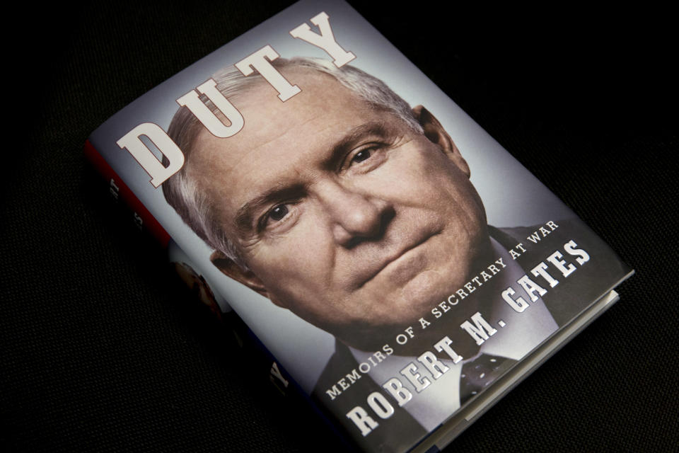 The book entitled: "Duty: Memoirs of a Secretary of War," by former Defense Secretary Robert Gates is seen in Washington, Wednesday, Jan. 8, 2014. The White House is bristling over former Defense Secretary Robert Gates' new memoir accusing President Barack Obama of showing too little enthusiasm for the U.S. war mission in Afghanistan and sharply criticizing Vice President Joe Biden's foreign policy instincts. (AP Photo/Jacquelyn Martin)