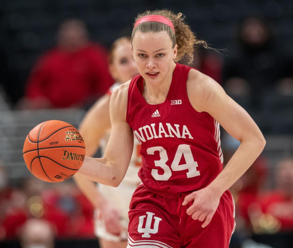 Indiana Hoosiers guard Grace Berger (34) works a possession, Friday, March 4, 2022, during women’s Big Ten tournament action from Gainbridge Fieldhouse in Indianapolis. Indiana won 62-51. 