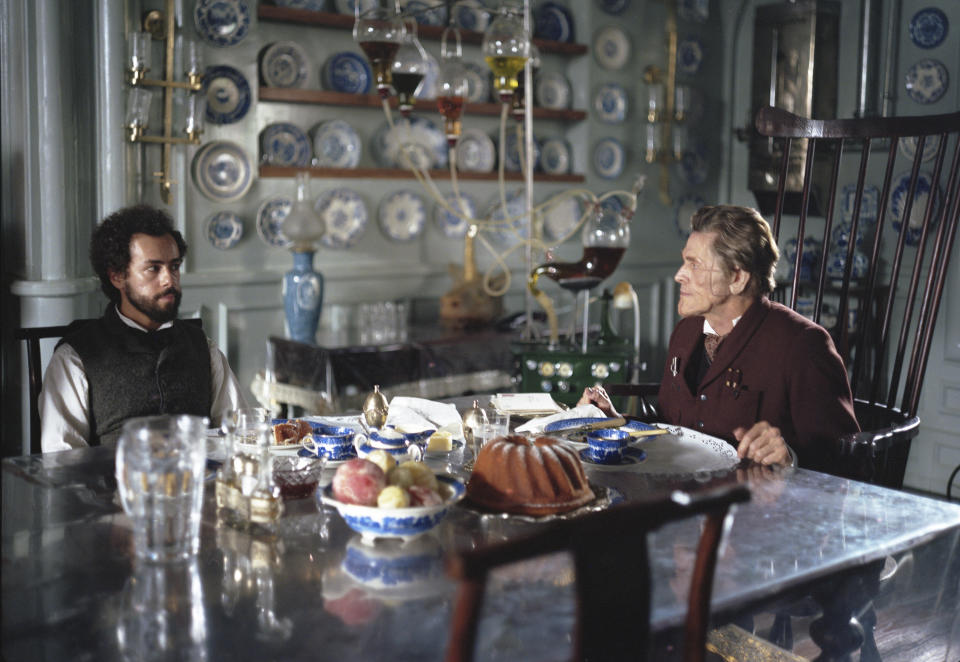 This image released by Searchlight Pictures shows Ramy Youssef, left, and Willem Dafoe in a scene from "Poor Things." (Yorgos Lanthimos/Searchlight Pictures via AP)