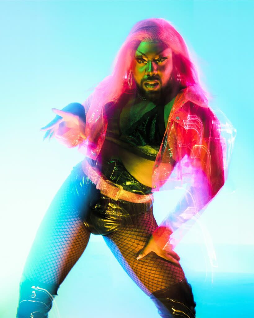 Stylised image of a drag artist against a gradient backdrop