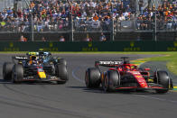 Ferrari driver Charles Leclerc of Monaco leads Red Bull driver Sergio Perez of Mexico during the Australian Formula One Grand Prix at Albert Park, in Melbourne, Australia, Sunday, March 24, 2024. (AP Photo/Asanka Brendon Ratnayake)