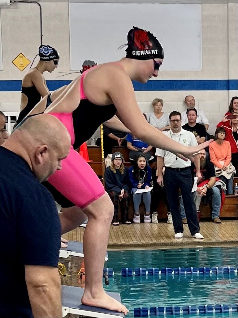 Pleasant's Addison Gierhart gets ready to dive in for the 200-yard medley relay during the Mid Ohio Athletic Conference Swim Championships this season at Ontario. Gierhart qualified for the Division II district in two individual events.