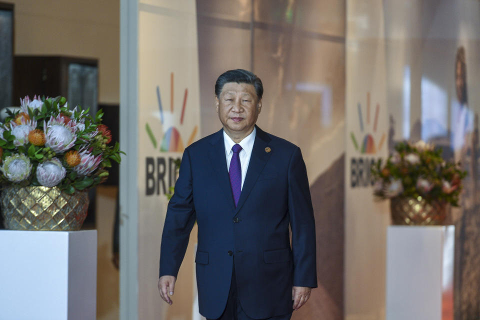 China's President Xi Jinping arrives for the BRICS Summit in Johannesburg, South Africa, Wednesday, Aug. 23, 2023. (Alet Pretorius/Pool Photo via AP)