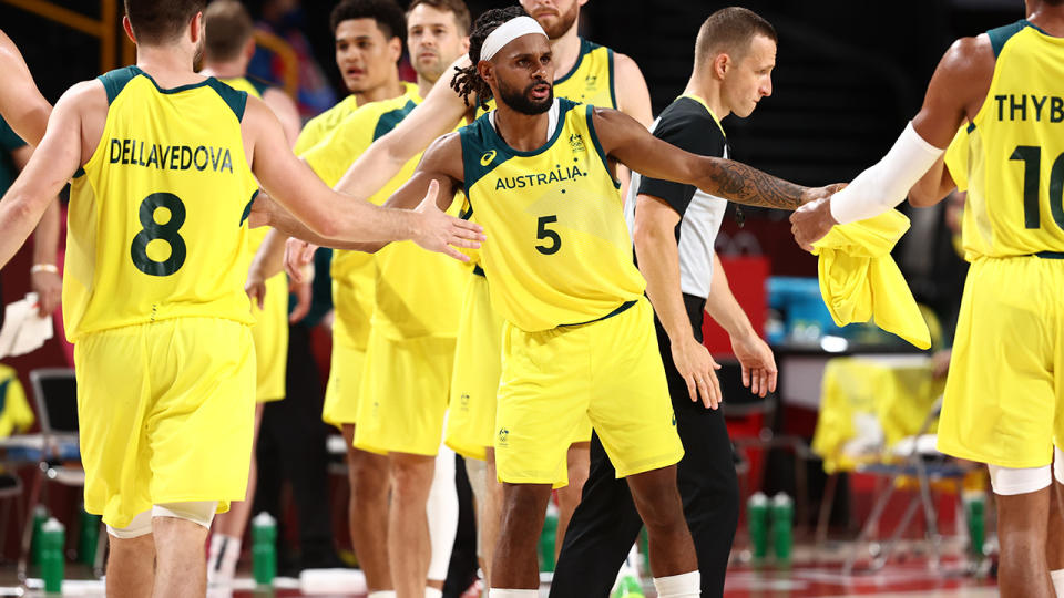 Patty Mills and the Boomers, pictured here celebrating their quarter-final victory over Argentina.