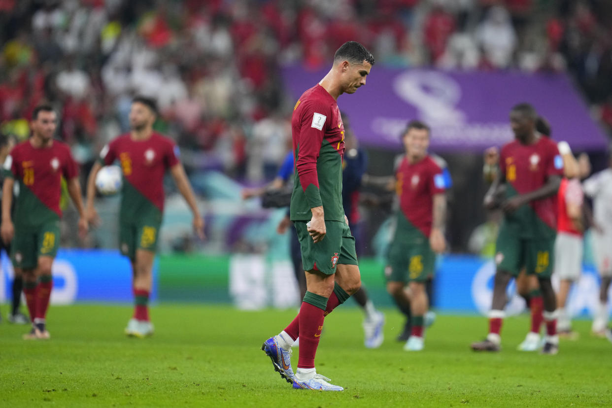 Portugal's Cristiano Ronaldo walks off the field after the 6-1 win during the World Cup round of 16 soccer match between Portugal and Switzerland, at the Lusail Stadium in Lusail, Qatar, Tuesday, Dec. 6, 2022. (AP Photo/Natacha Pisarenko)