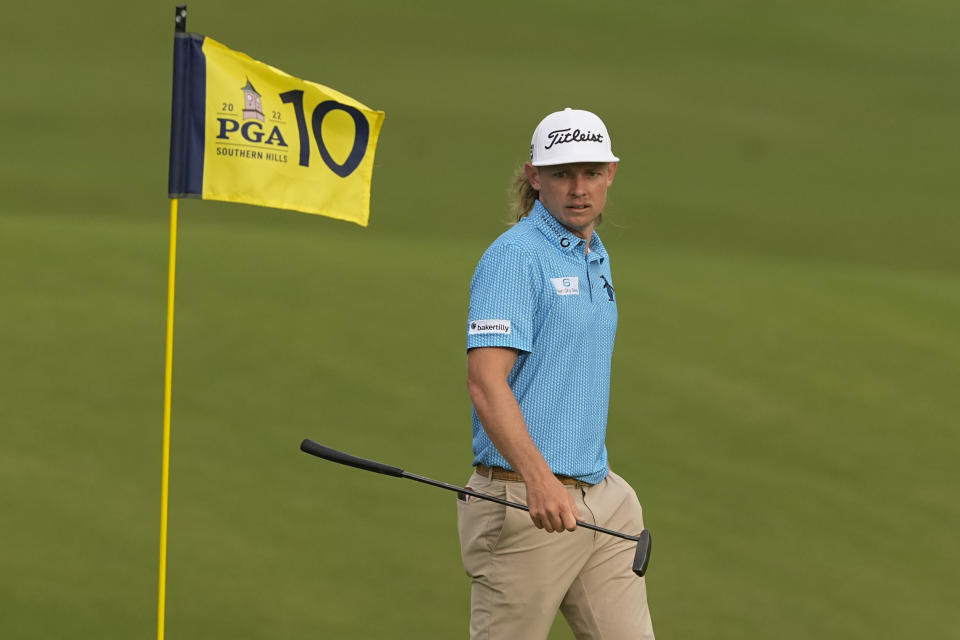 Cameron Smith, of Australia, lines up a putt on the 10th hole during the first round of the PGA Championship golf tournament, Thursday, May 19, 2022, in Tulsa, Okla. (AP Photo/Matt York)