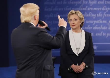 Republican U.S. presidential nominee Donald Trump speaks during the presidential town hall debate with Democratic U.S. presidential nominee Hillary Clinton at Washington University in St. Louis, Missouri, U.S., October 9, 2016. REUTERS/Shannon Stapleton