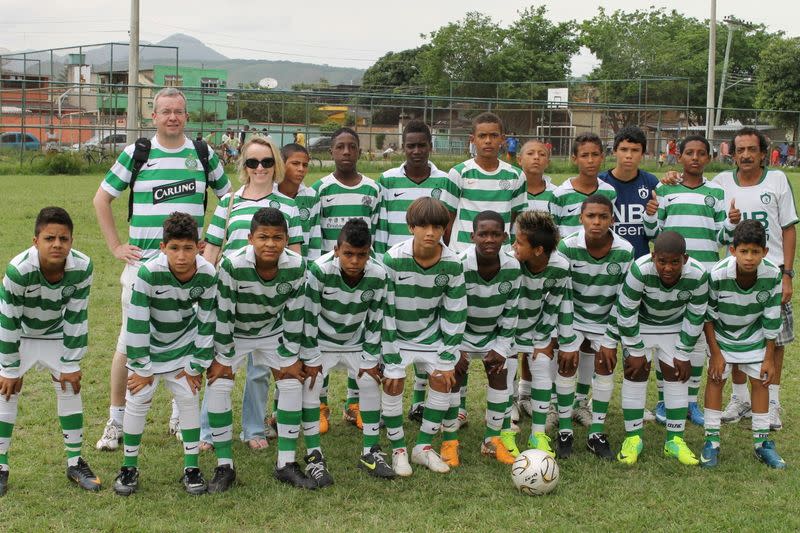 Patrick de Paula wearing a shirt of the Mario Lombardi Celtic poses for a photo in Campo Grande