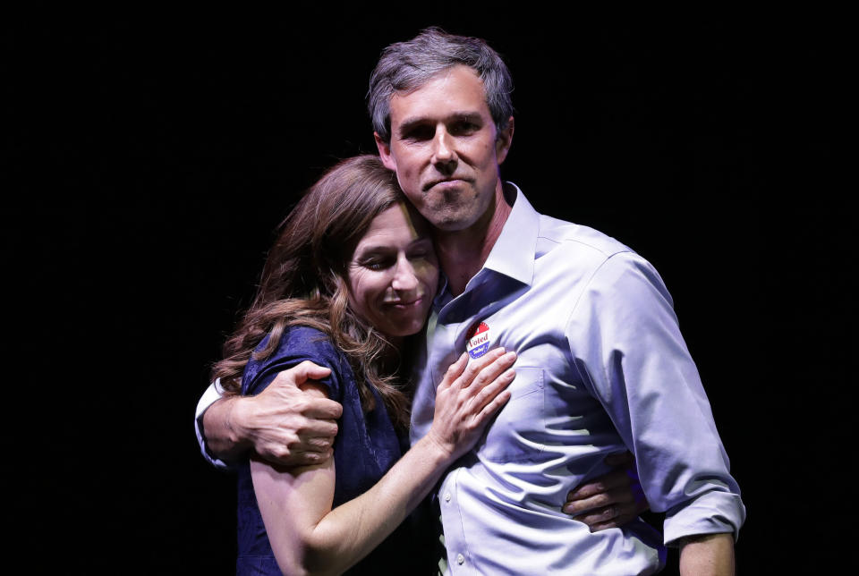 U.S. Rep. Beto O'Rourke, the 2018 Democratic Candidate for U.S. Senate in Texas, right, and his wife, Amy Sanders, stand together during his election night party, Tuesday, Nov. 6, 2018, in El Paso, Texas., after he was defeated by Sen. Ted Cruz, R-Texas. (AP Photo/Eric Gay)