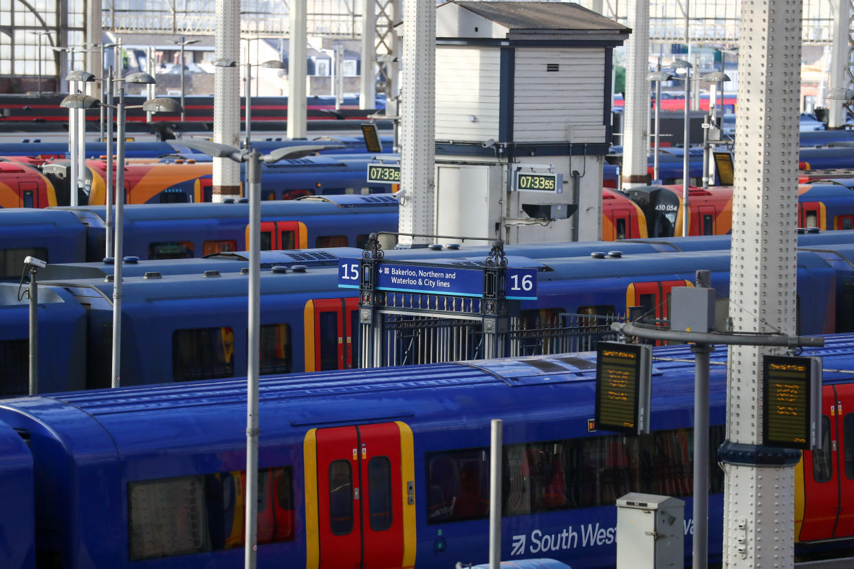 Railway trains, operated by South Western Railways run by the FirstGroup Plc and MTR Corp. Ltd. franchise, sit at platforms at London Waterloo railway station in London, U.K., on Thursday, May 21, 2020. Photo: Simon Dawson/Bloomberg