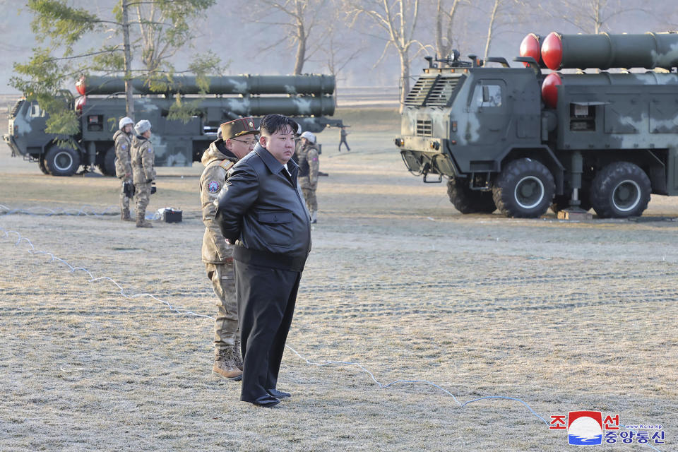 In this photo provided by the North Korean government, North Korean leader Kim Jong Un, center, supervises a live-fire drill of “super-large” multiple in North Korea Monday, March 18, 2024. Independent journalists were not given access to cover the event depicted in this image distributed by the North Korean government. The content of this image is as provided and cannot be independently verified. Korean language watermark on image as provided by source reads: "KCNA" which is the abbreviation for Korean Central News Agency. (Korean Central News Agency/Korea News Service via AP)