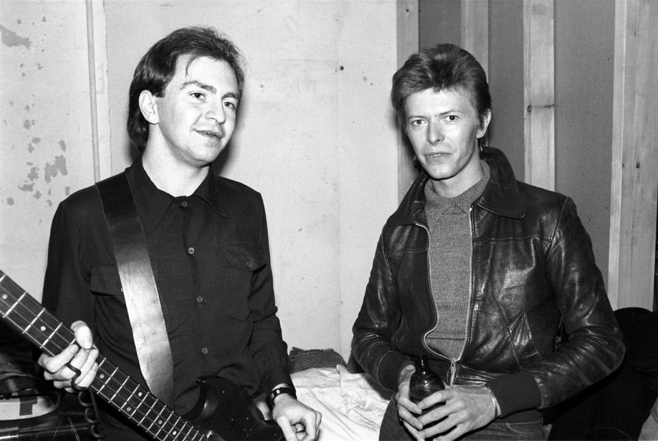 <p>David Bowie and Gerald Casale of Devo pose backstage on November 14, 1977 at Max's in Kansas City.</p>
