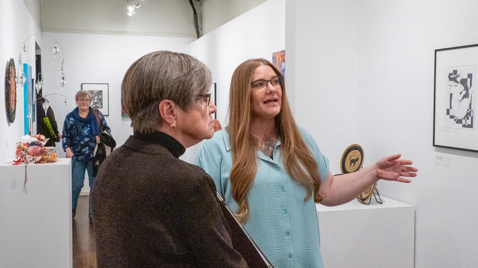 Kaila Mock, owner of Trox Gallery, shows Gov. Laura Kelly around the store during the governor's April 25, 2024, visit to Emporia