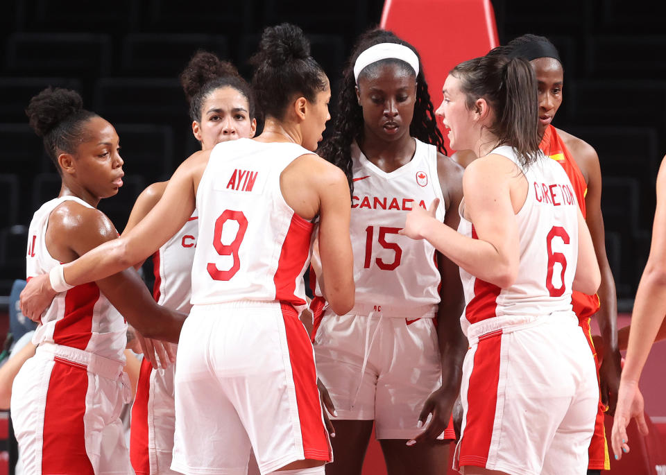 SAITAMA, JAPAN - AUGUST 01: Members of Team Canada huddle during the second half of a Women's Basketball Preliminary Round Group A game against Spain at Saitama Super Arena on August 01, 2021 in Saitama, Japan. (Photo by Gregory Shamus/Getty Images)