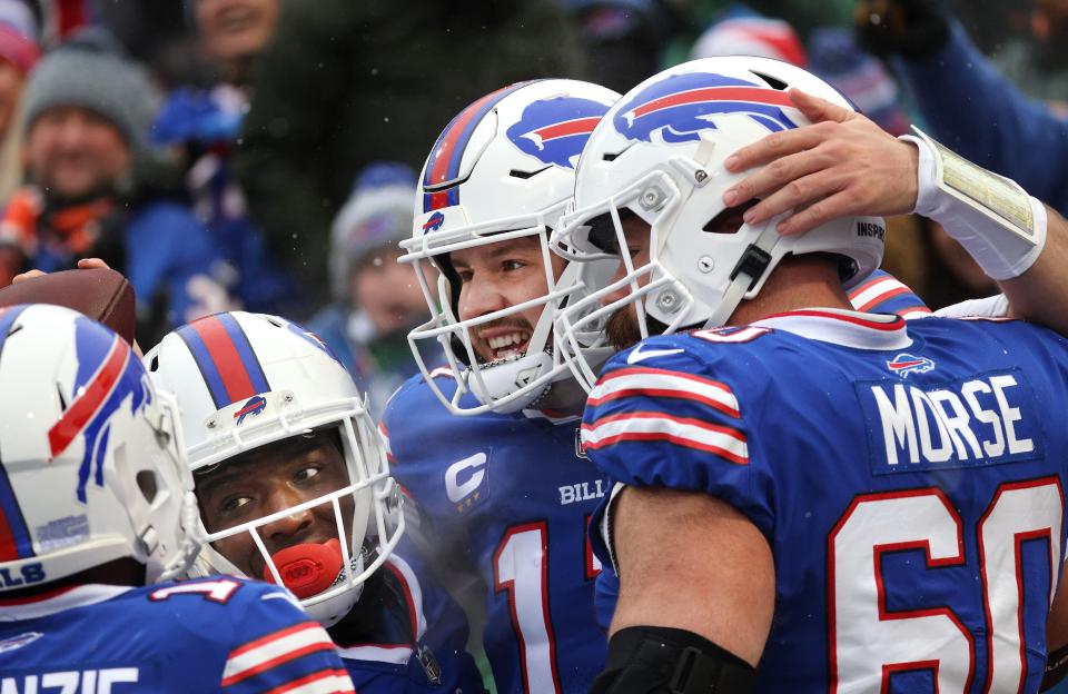 Josh Allen celebrates one of his two rushing  touchdowns in a 29-15 win over Atlanta.