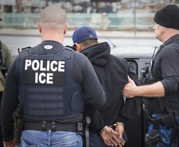 This photo, released Tuesday, Feb. 7, 2017, shows foreign nationals being arrested in a targeted enforcement operation by U.S. Immigration and Customs Enforcement (ICE) aimed at immigration fugitives, re-entrants and at-large criminal aliens in Los Angeles. (Photo: Charles Reed/U.S. Immigration and Customs Enforcement via AP)