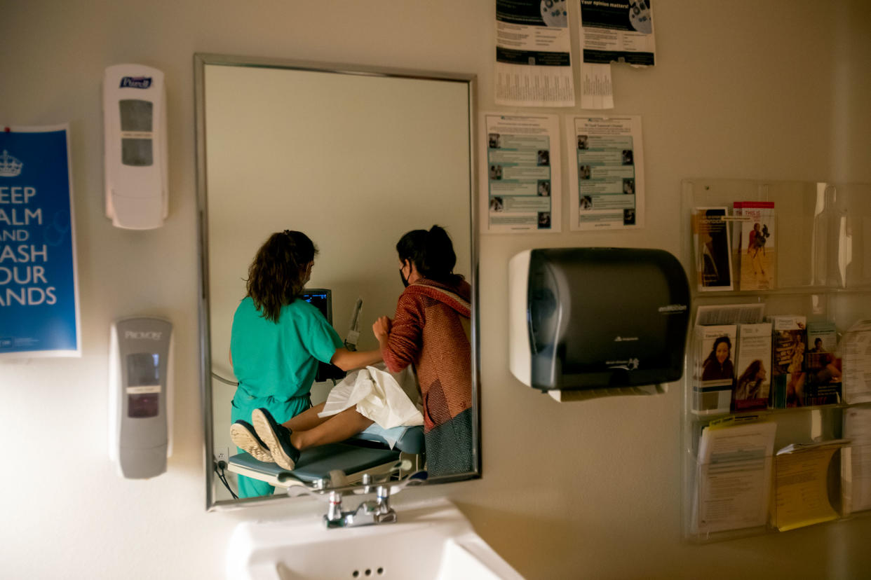 A family physician and her resident perform an ultrasound on a 39-year-old woman who already has four children the day before the Supreme Court overturned Roe v. Wade at the Center for Reproductive Health clinic in Albuquerque, New Mexico, on June 23, 2022.